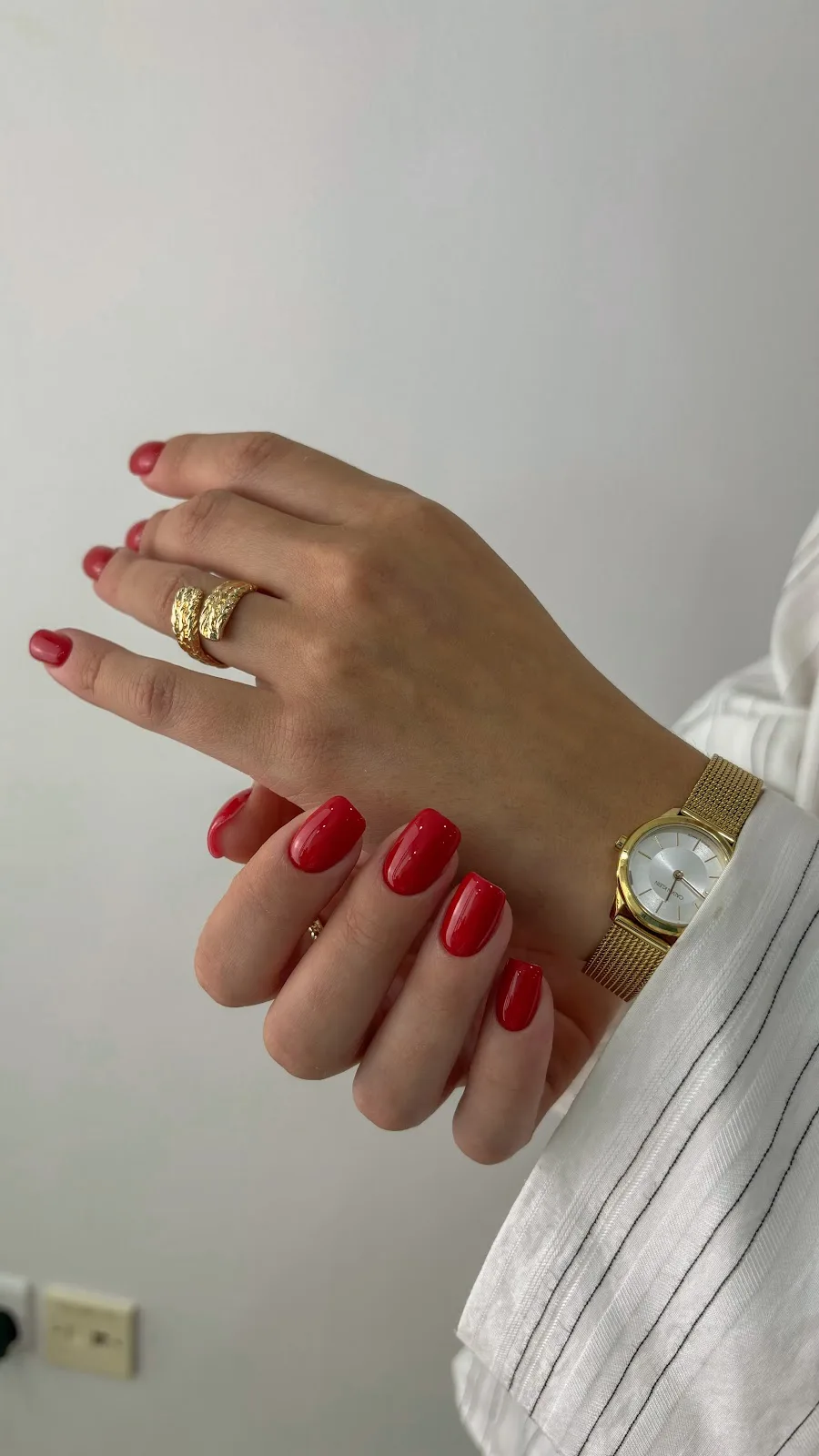 Glossy red classic manicure
