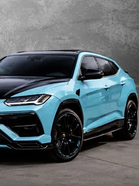 A pale-blue performance SUV prepared for detailing and protection