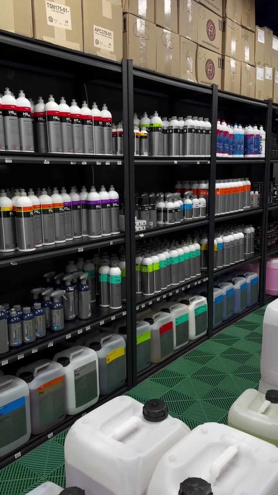 Koch-Chemie and other professional polishes lined up across the racks