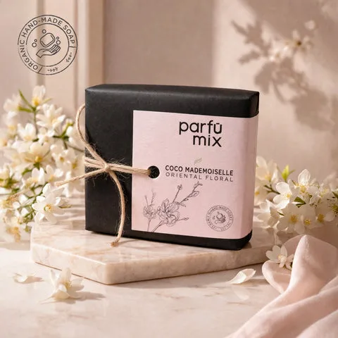 Parfumix handmade soap bar wrapped in black paper with a botanical label