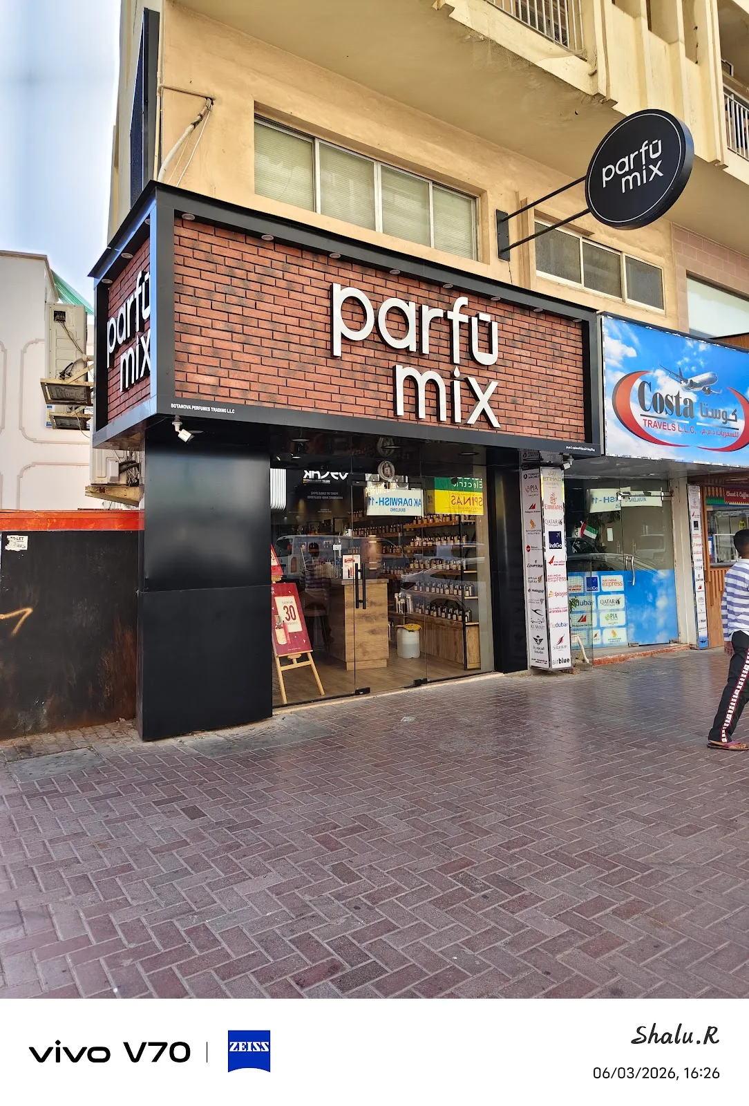 Parfumix storefront with brick facade in Deira