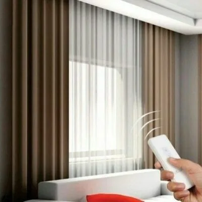 Motorised sheer curtains operated by remote control