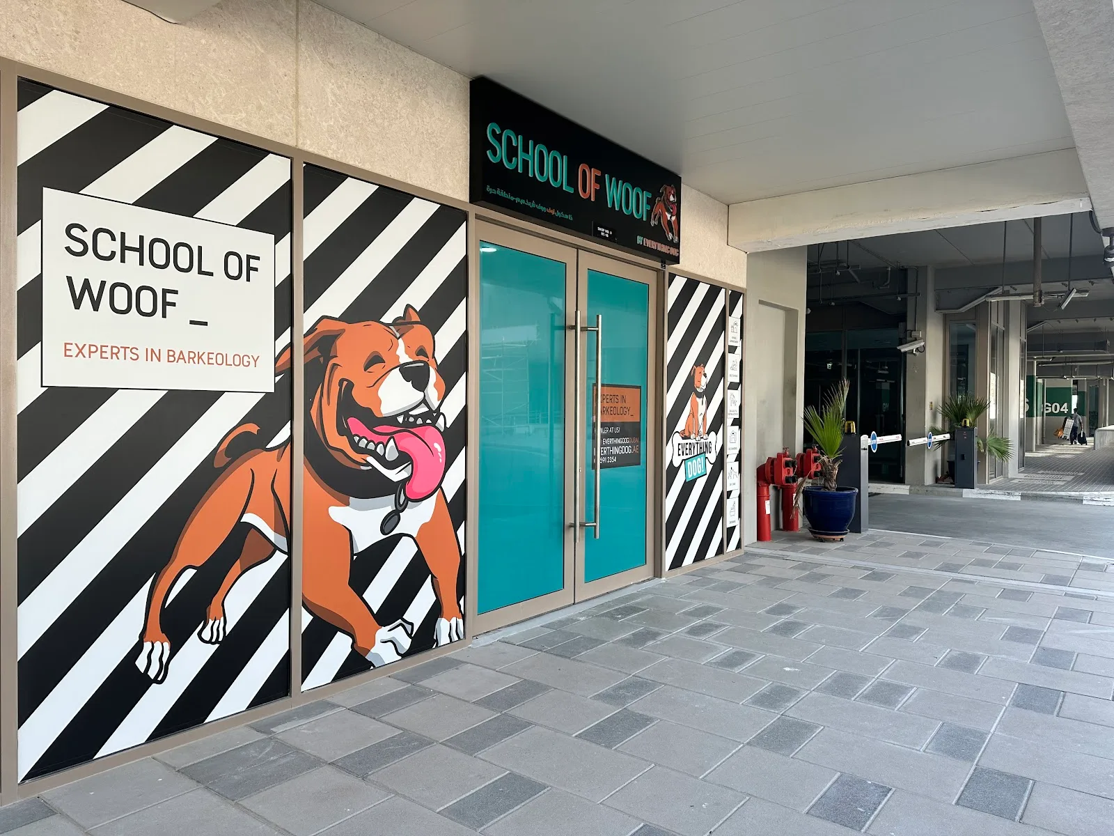 The School of Woof storefront with Experts in Barkeology signage