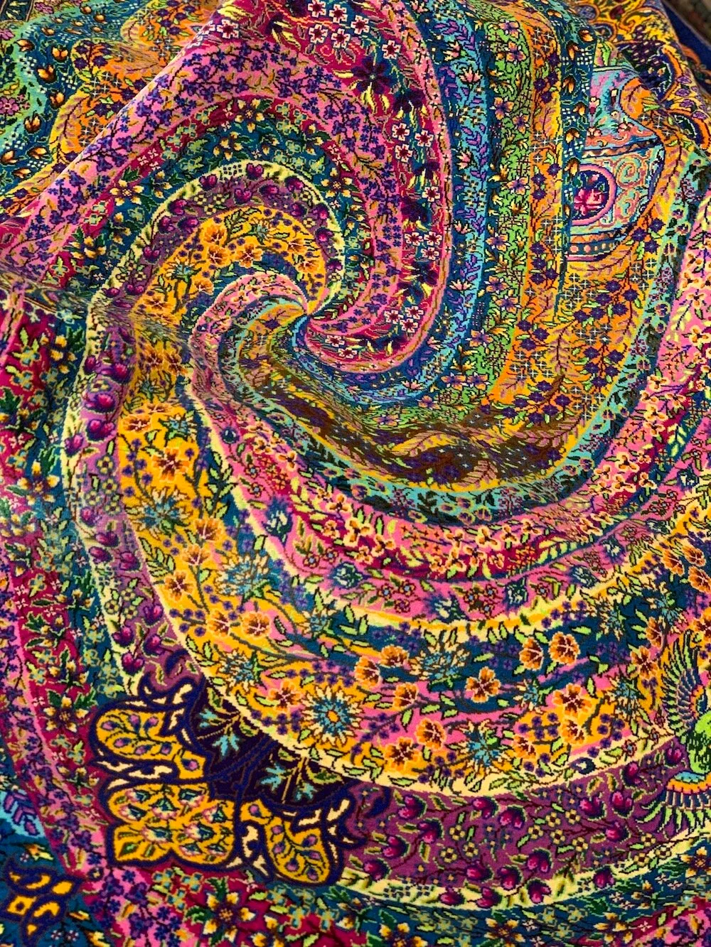 Multicoloured silk carpet with a swirling all-over design
