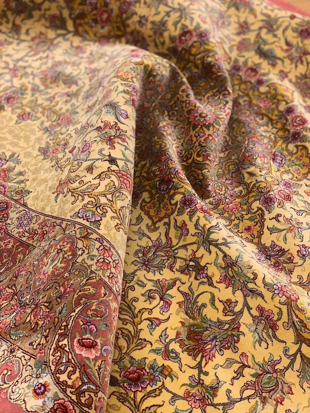 Golden silk carpet with a delicate all-over floral design