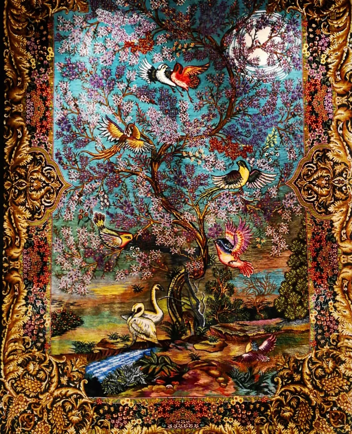 Pictorial silk tapestry of a blossoming tree with birds