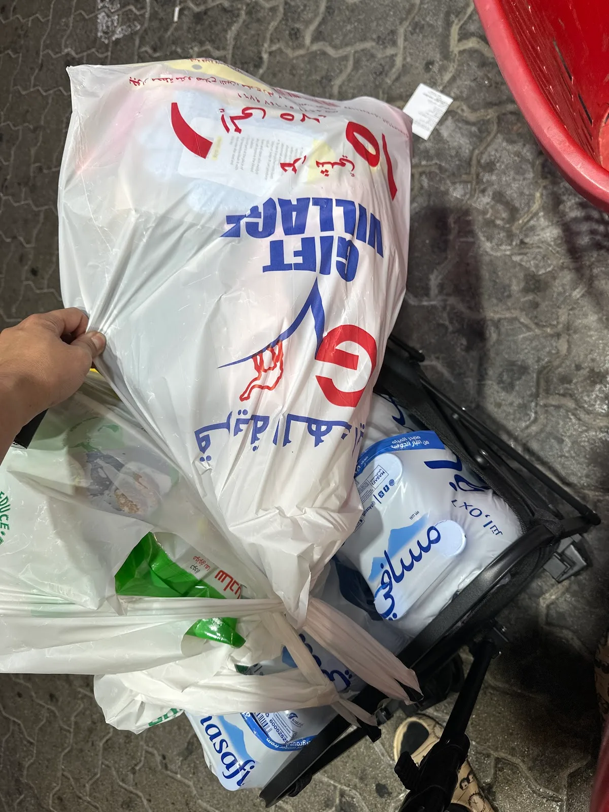 A Gifts Village branded shopping bag full of purchases