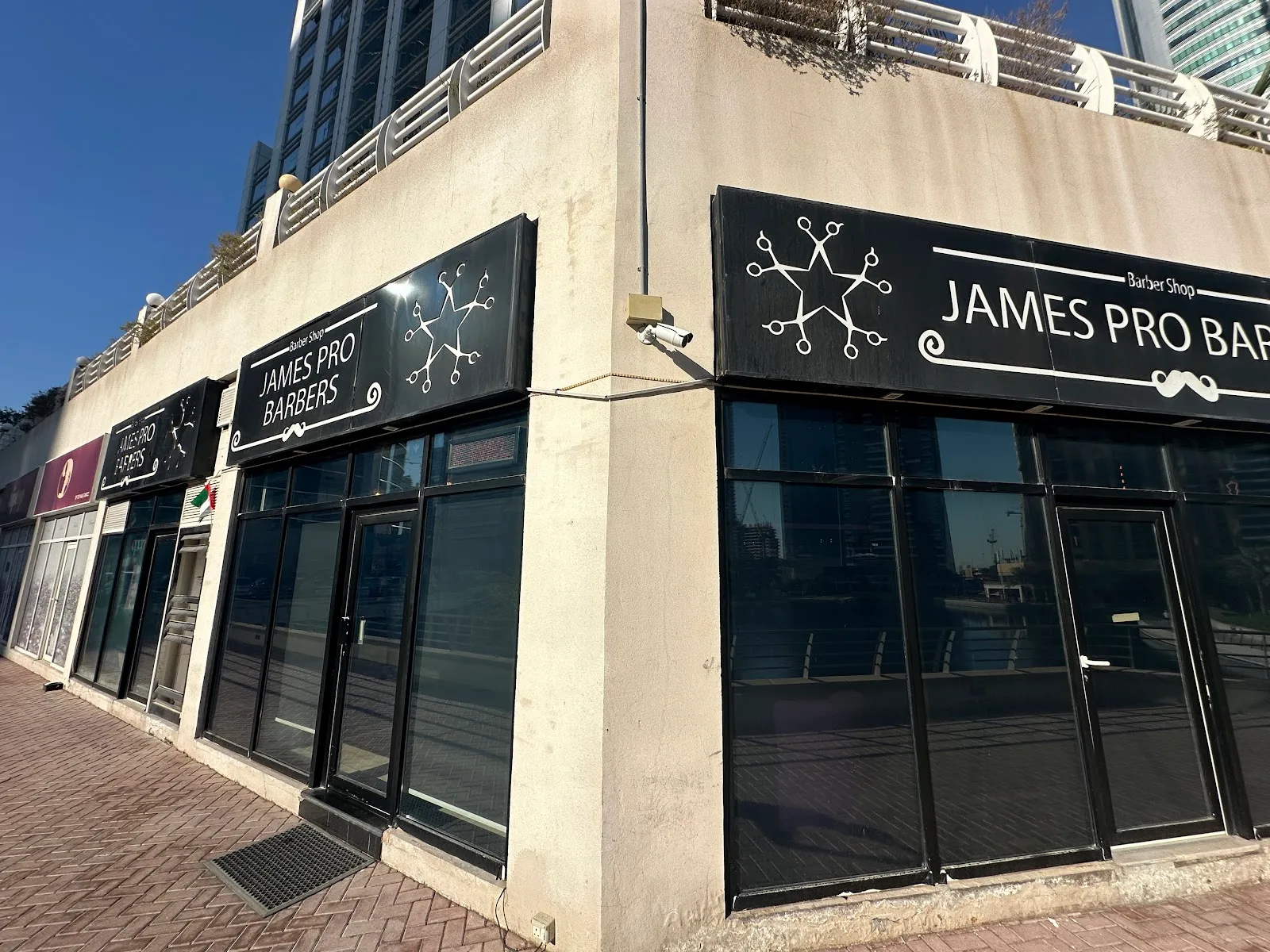 James Pro Barbers storefront signage in JLT