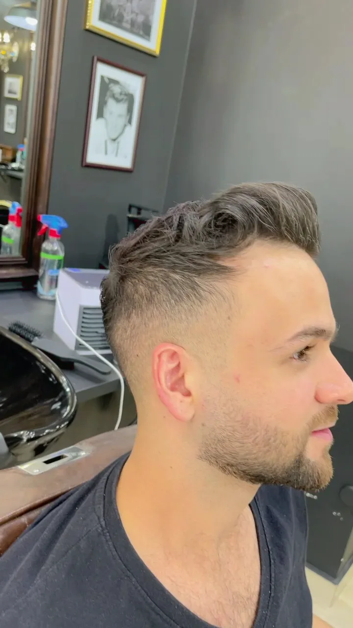 Textured quiff with a clean fade