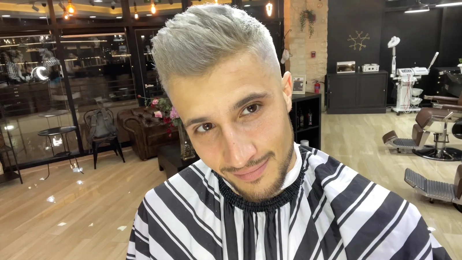 A silver-blonde colour and fade finish