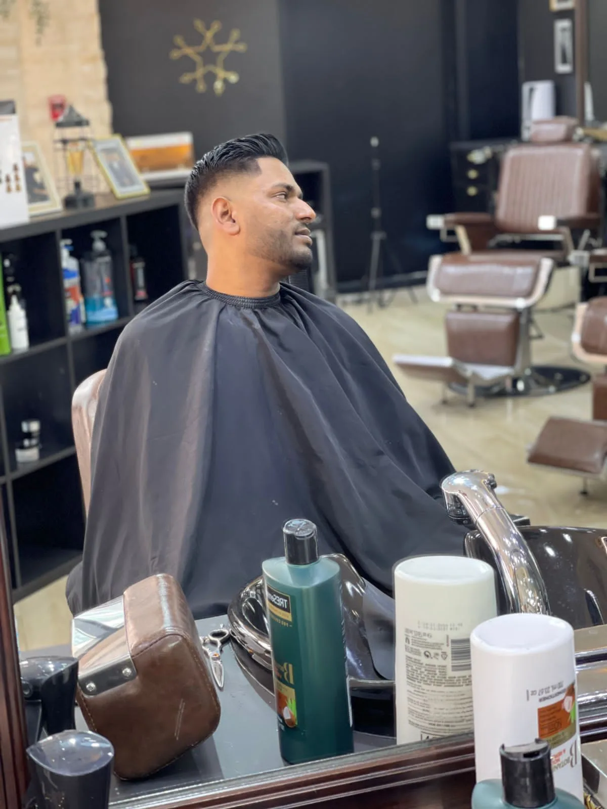 A slick-back with tight side fade