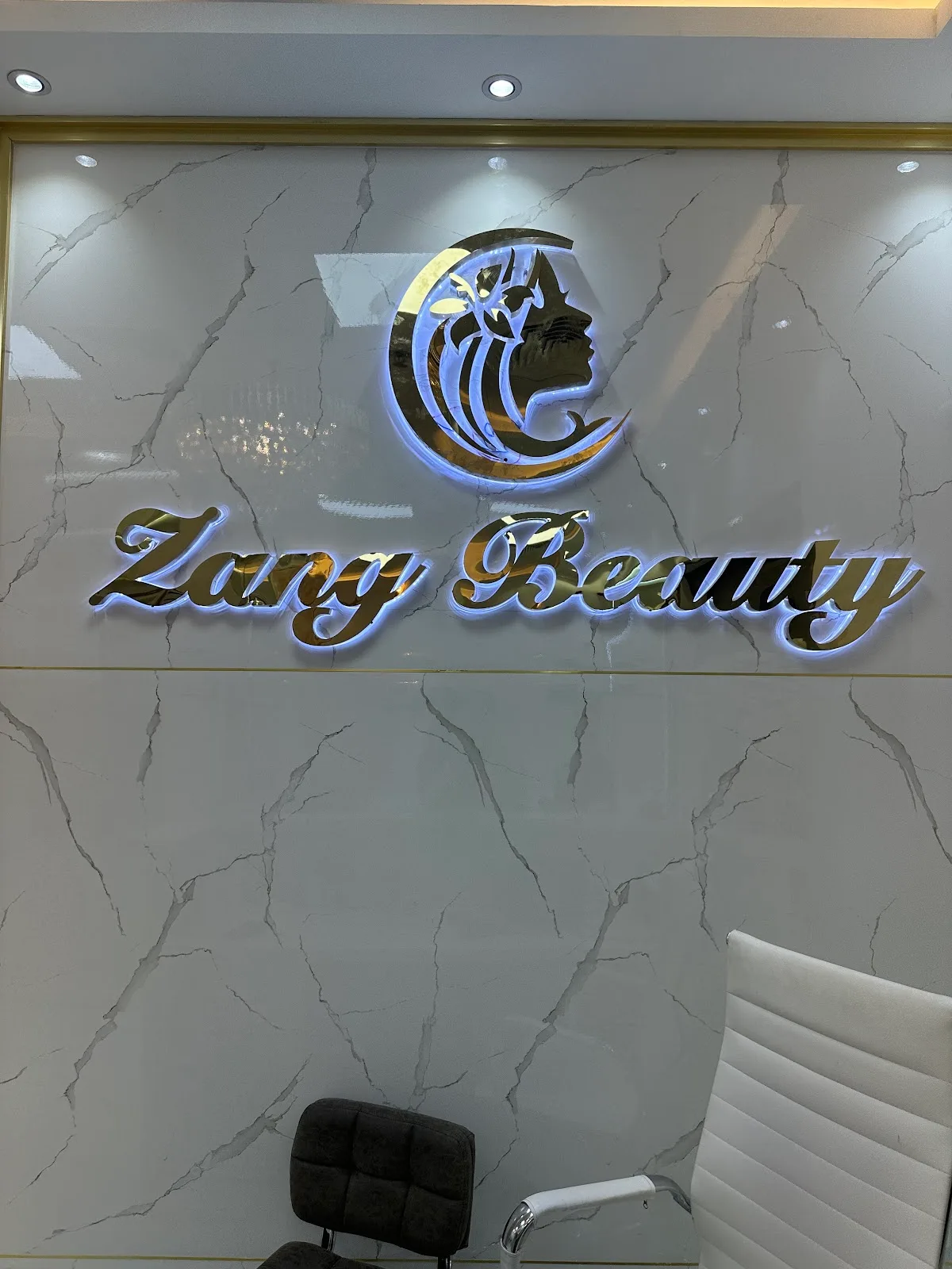 Zang Beauty gold sign on marble