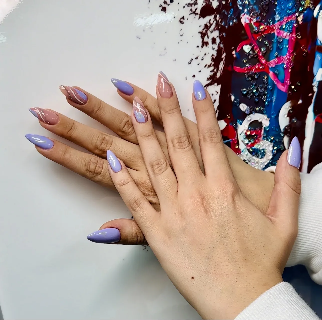 Lilac almond nails with fine line accent art
