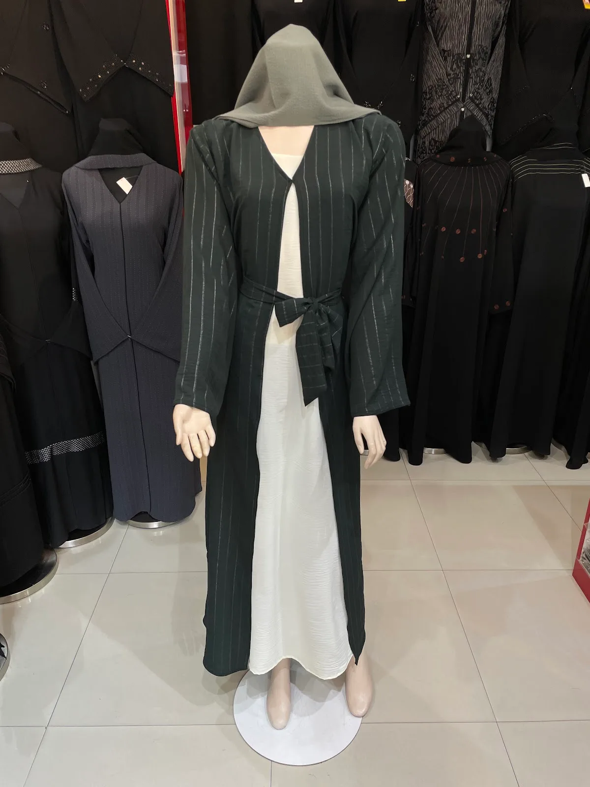 Open-front striped layered abaya with hood over a cream slip