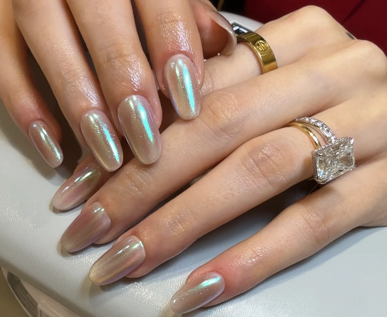 Pearly chrome almond manicure at ARFI NAILS