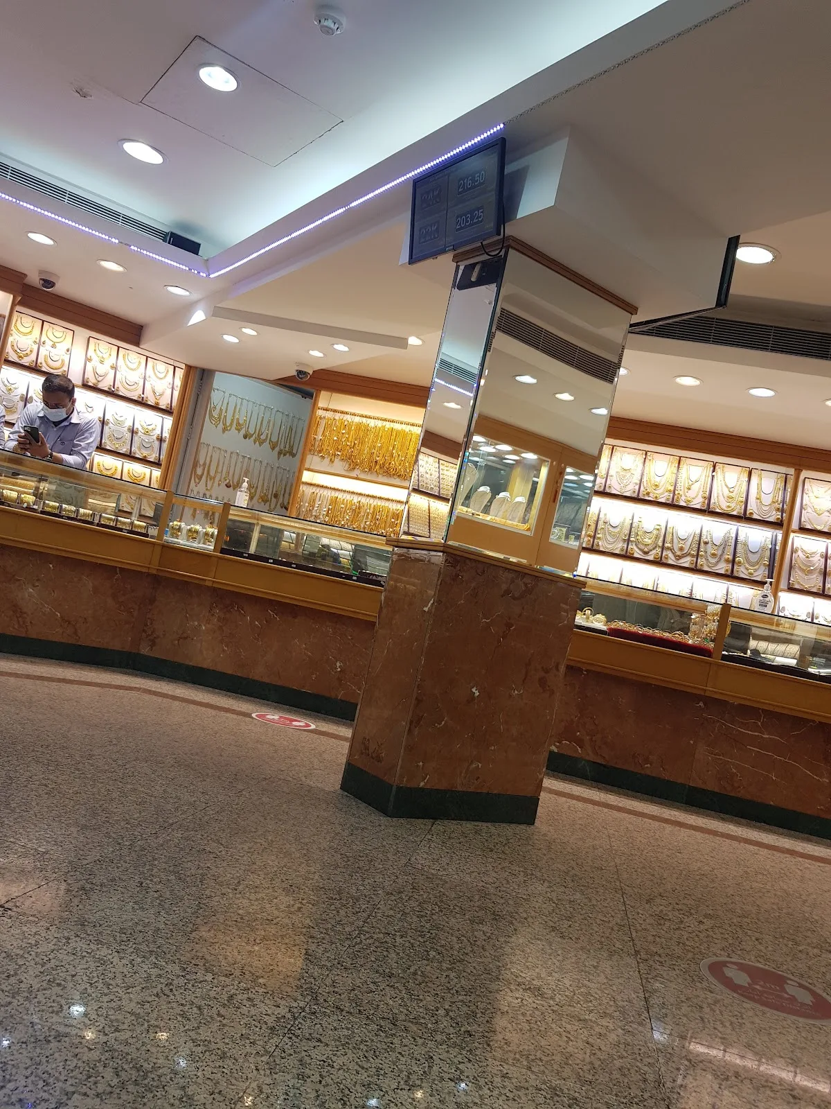 Gold jewellery display counters with the daily rate board overhead