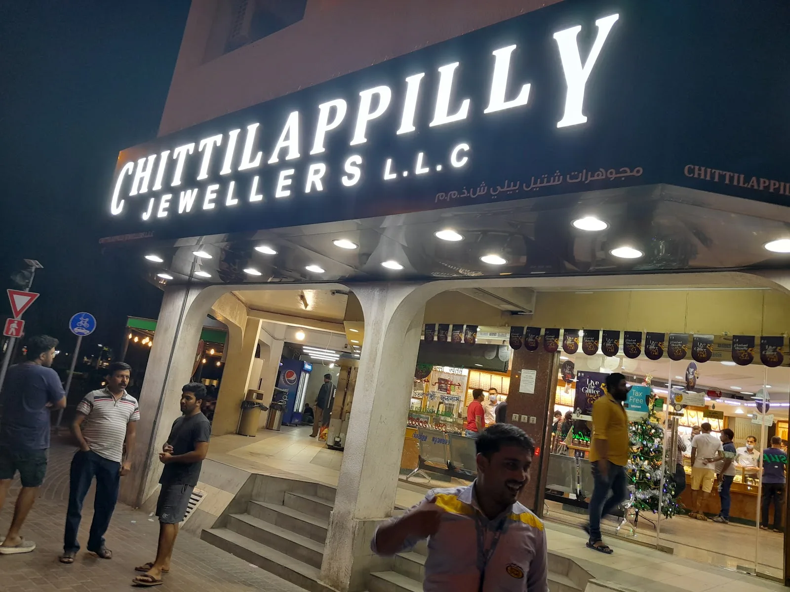 Chittilappilly Jewellers storefront lit up at night