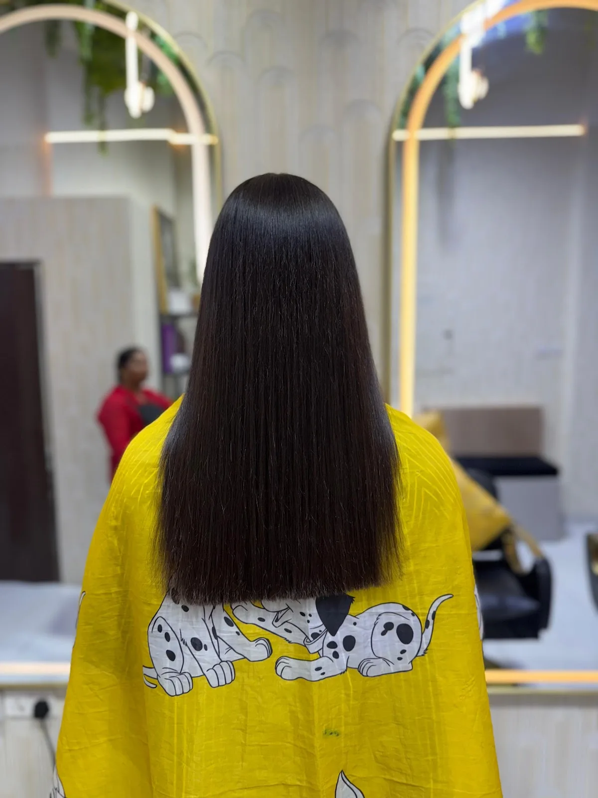 Sleek brown hair finished after treatment