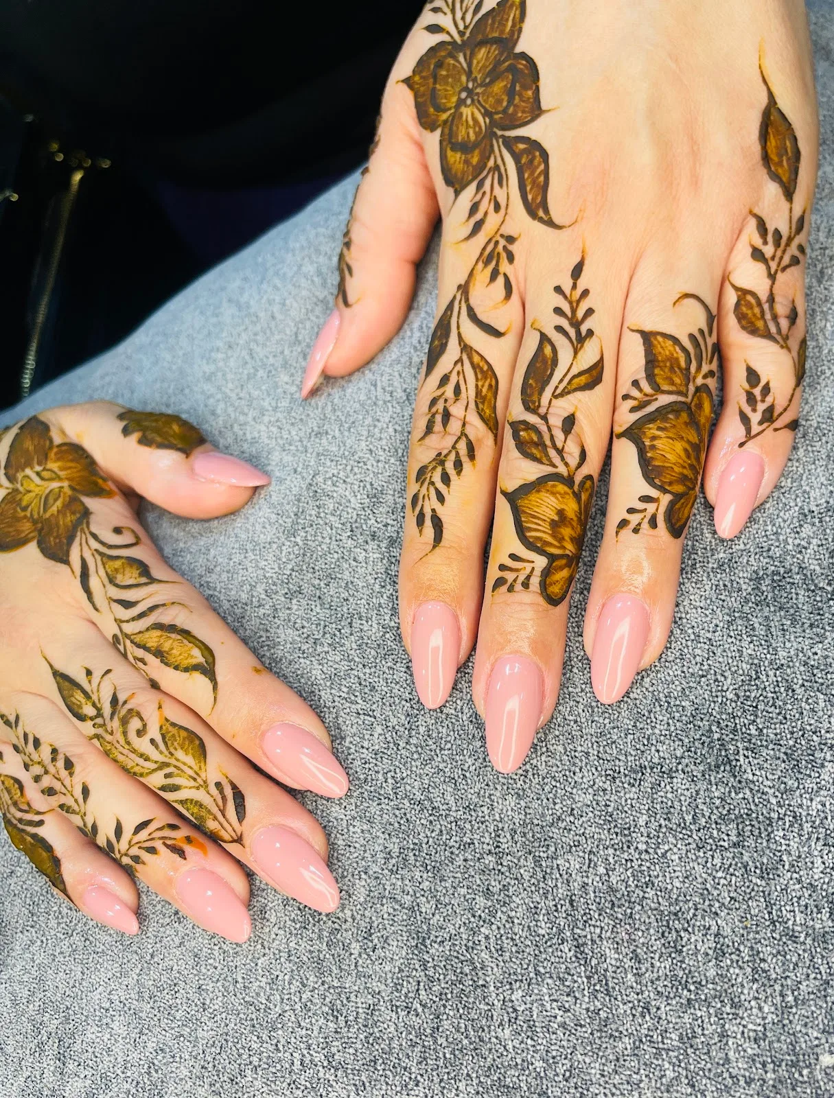 Floral henna with soft pink almond nails