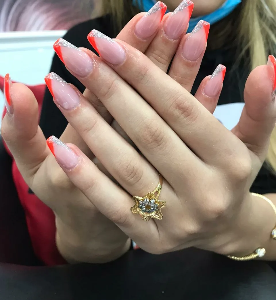 Long coffin nails with orange and glitter French tips