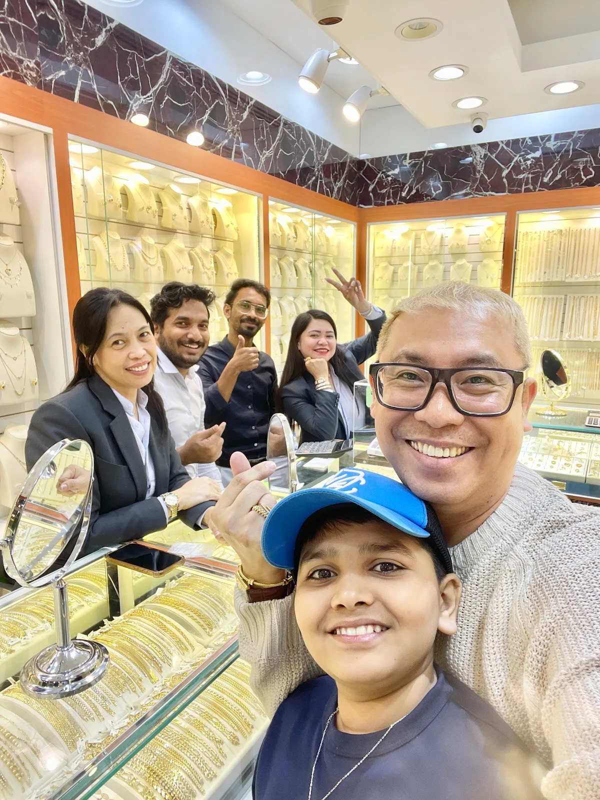 Smiling customers and staff