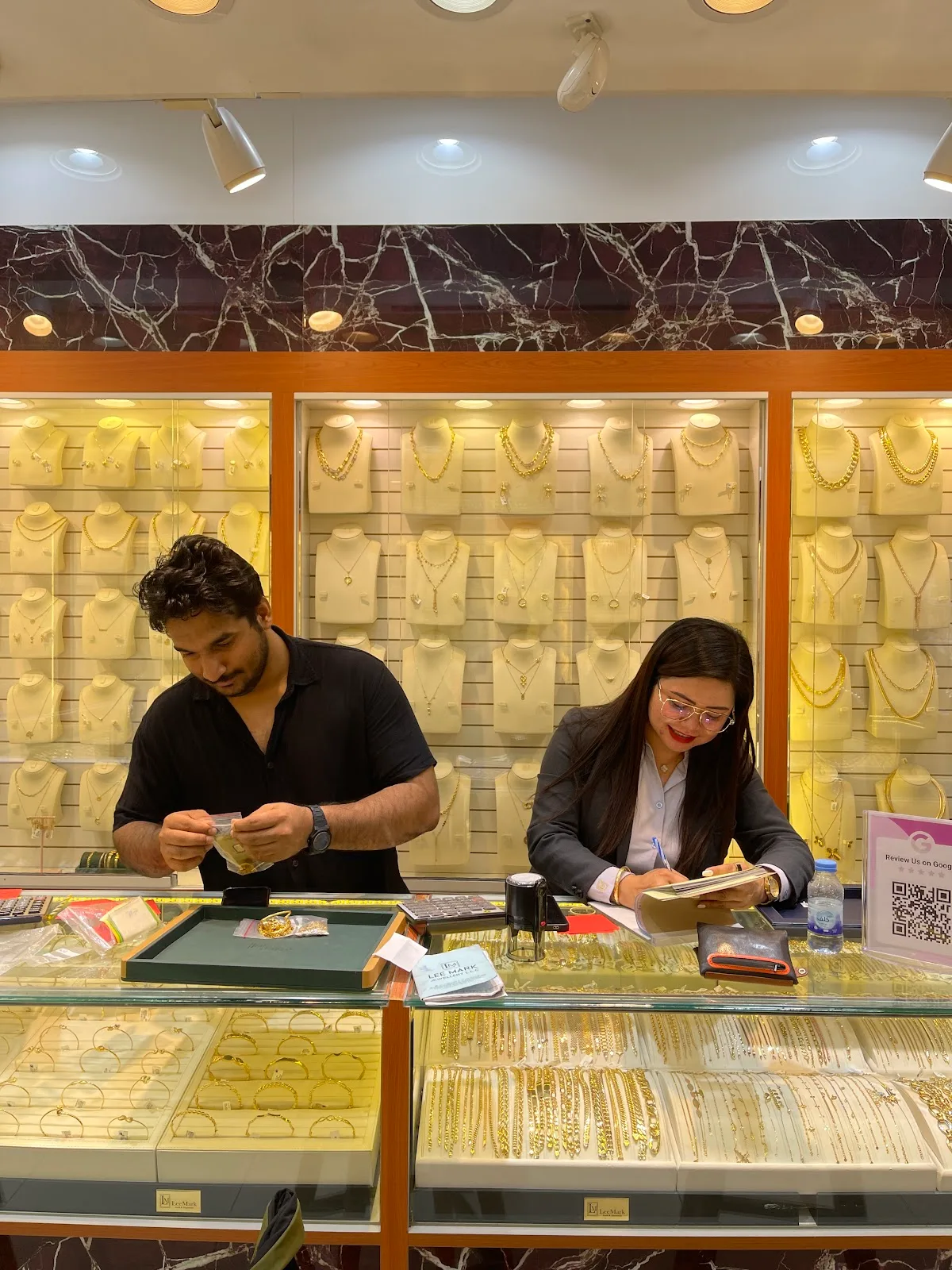 Staff serving customers at the counter