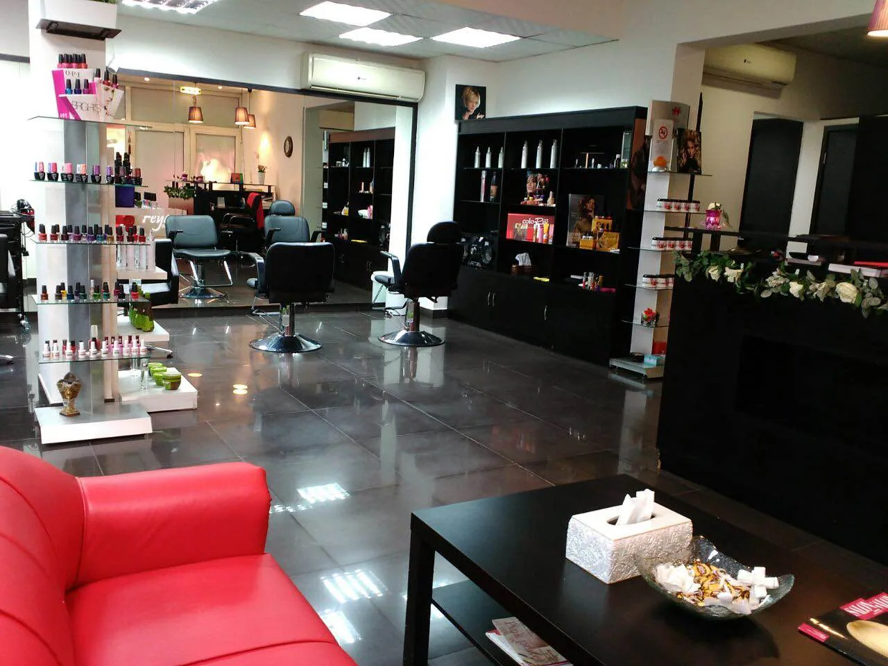 Inside Feya Beauty Salon — styling chairs, nail colour displays and a welcoming seating area
