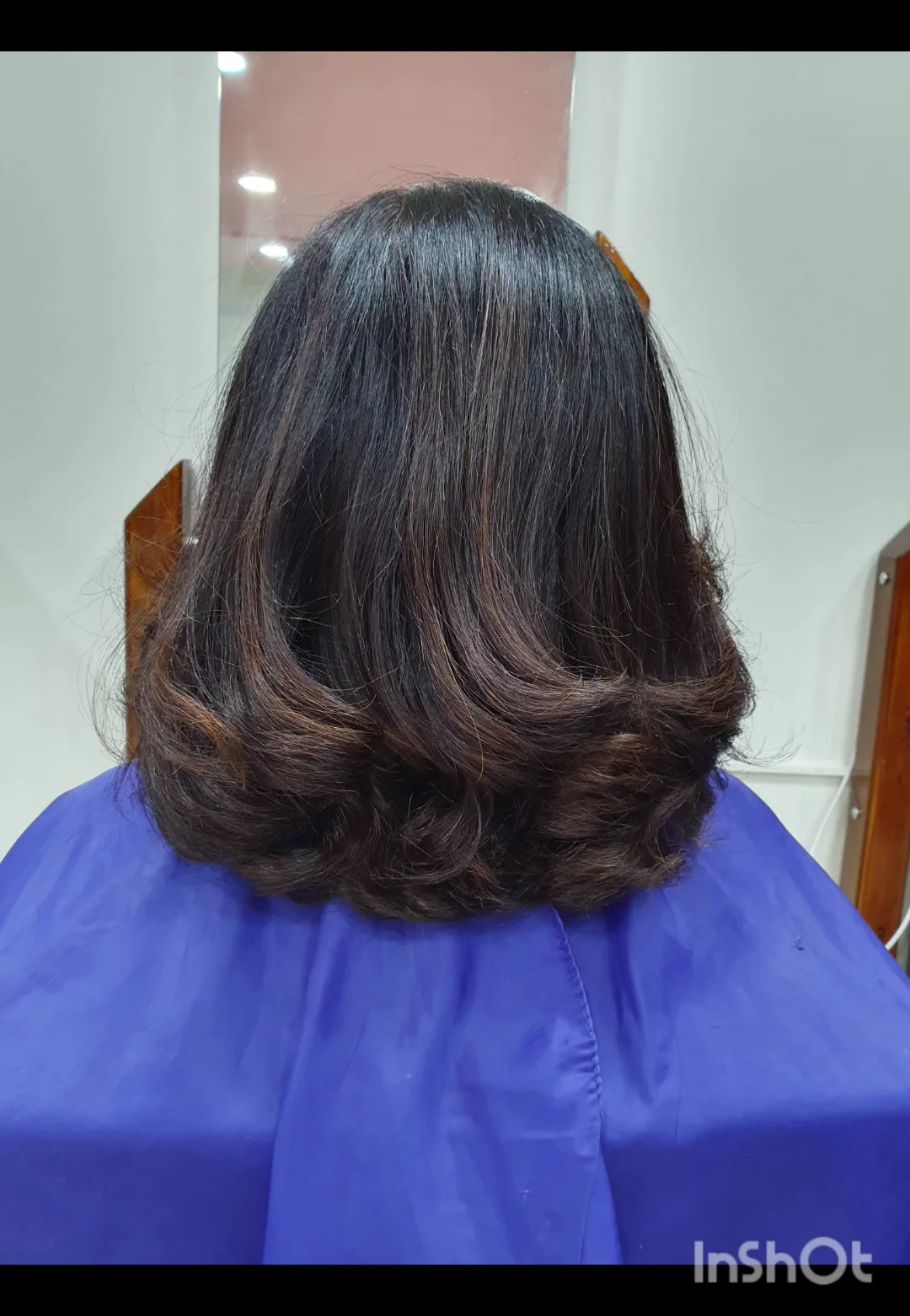 Shoulder-length hair with a bouncy blow-dry