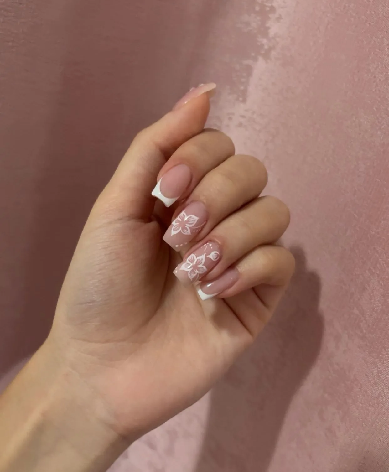 French nails with delicate white flower nail art