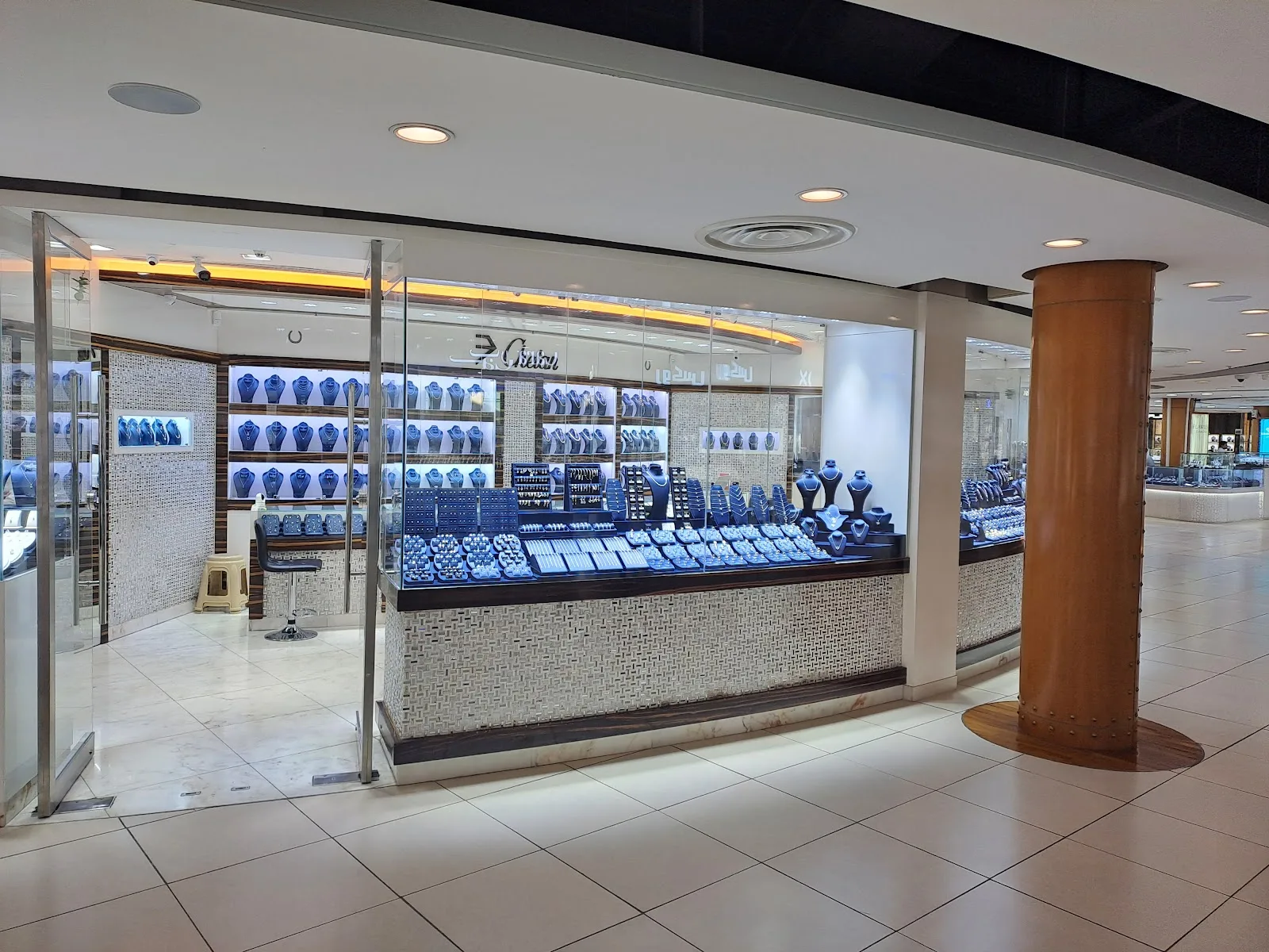 The Chetan Jewellers storefront on Sheikh Zayed Road, with lit navy display cases visible through glass
