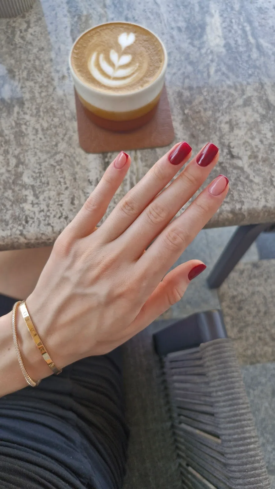Burgundy manicure with coffee