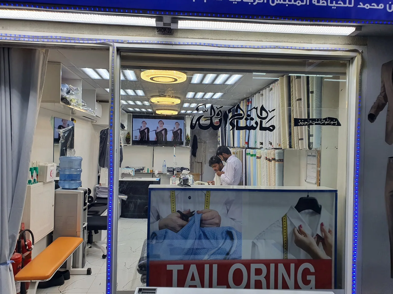View into the Rizwan Raza tailoring shop from the street window