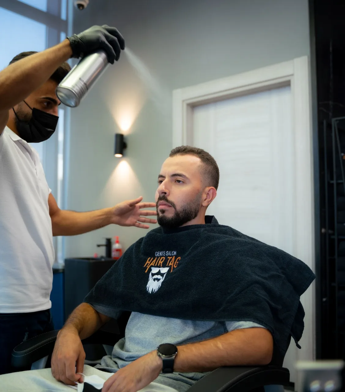 Client being styled and finished at the chair