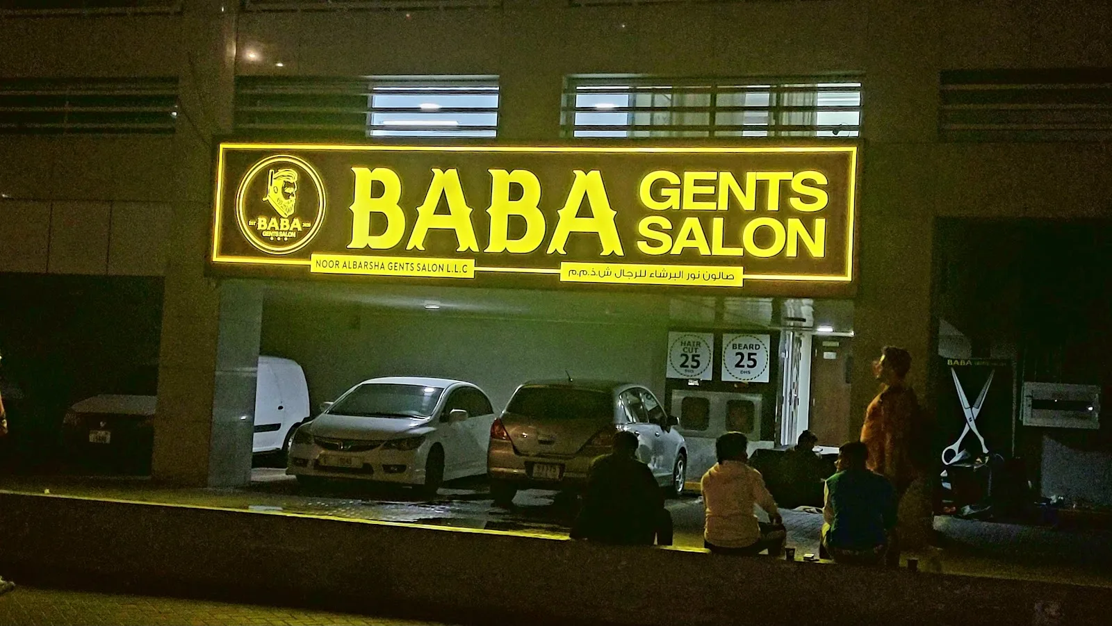 Evening view of the salon entrance and parking