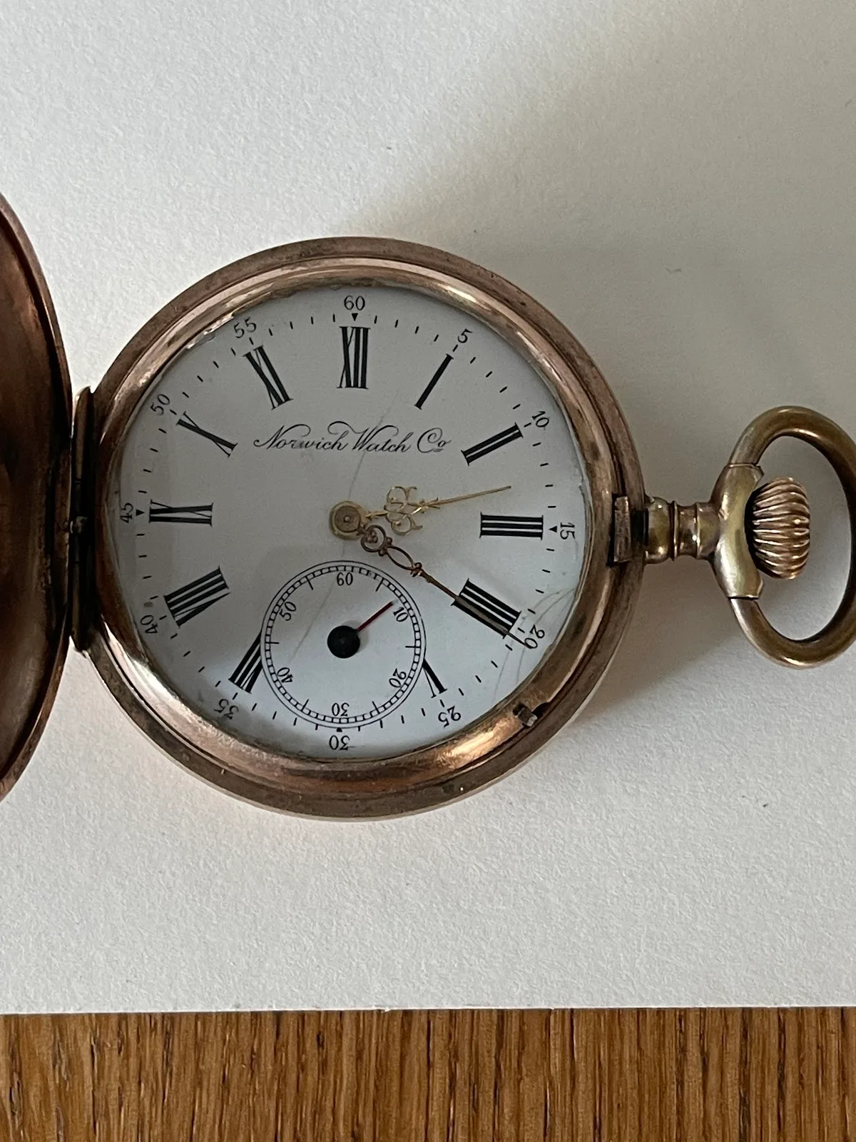 A silver Norwich Watch Co pocket watch with Roman numerals, serviced at the Osama workshop
