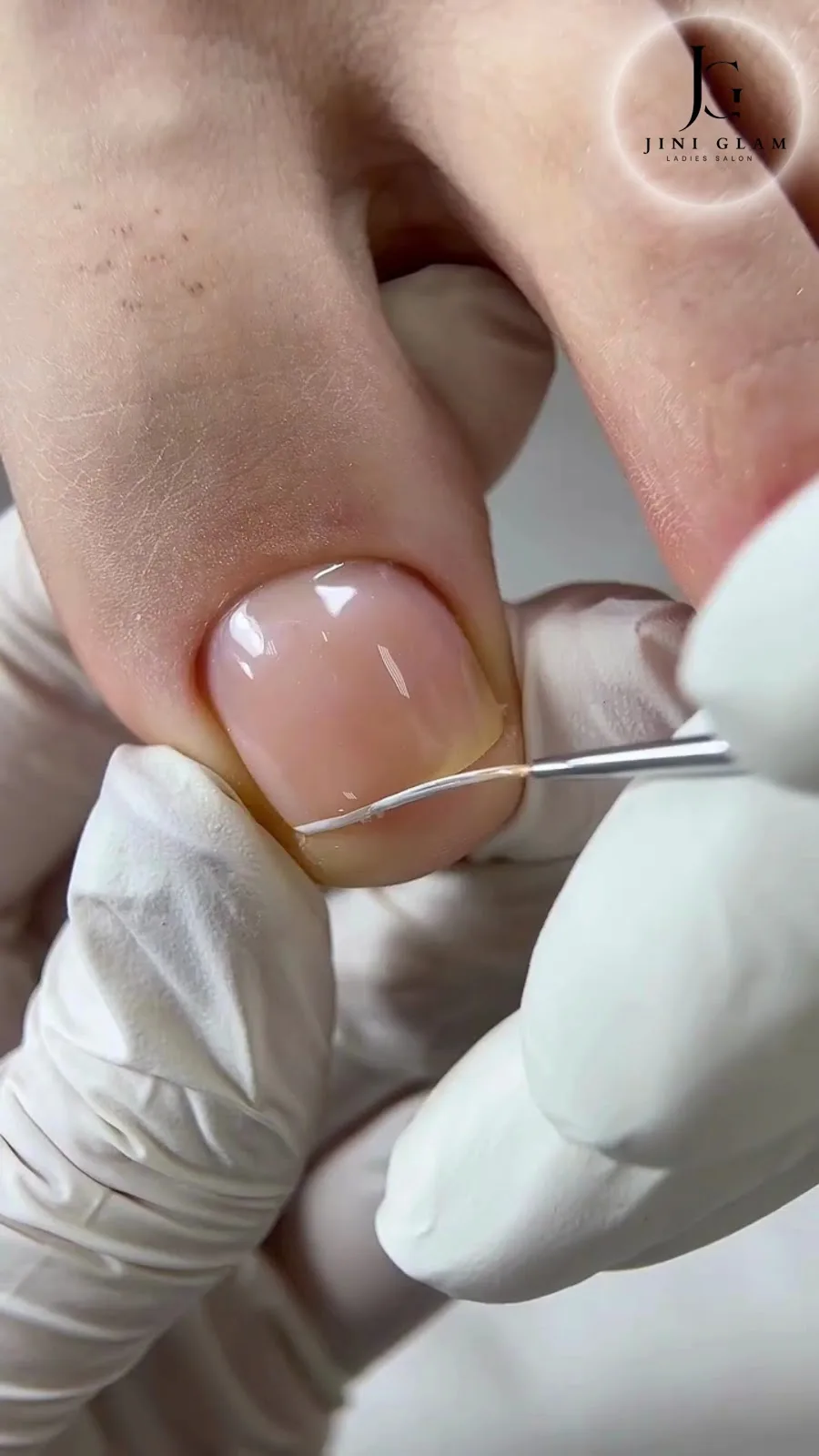 Detailed cuticle and pedicure care in progress
