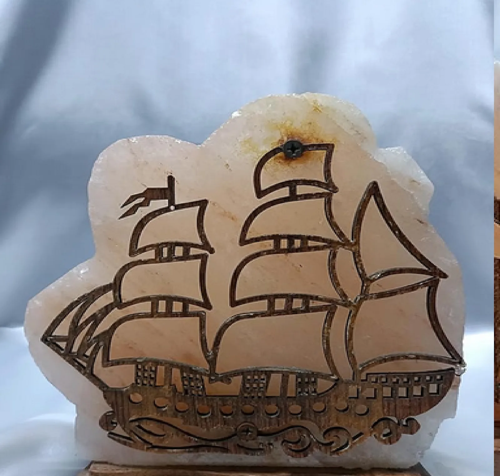 Himalayan salt lamp engraved with a tall sailing ship