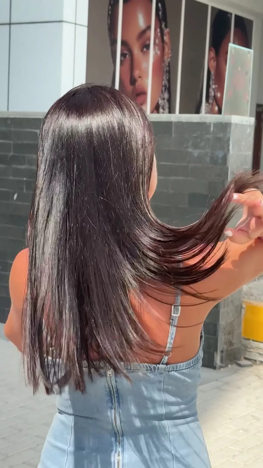 Healthy, smooth, glossy hair after treatment at CRUSH