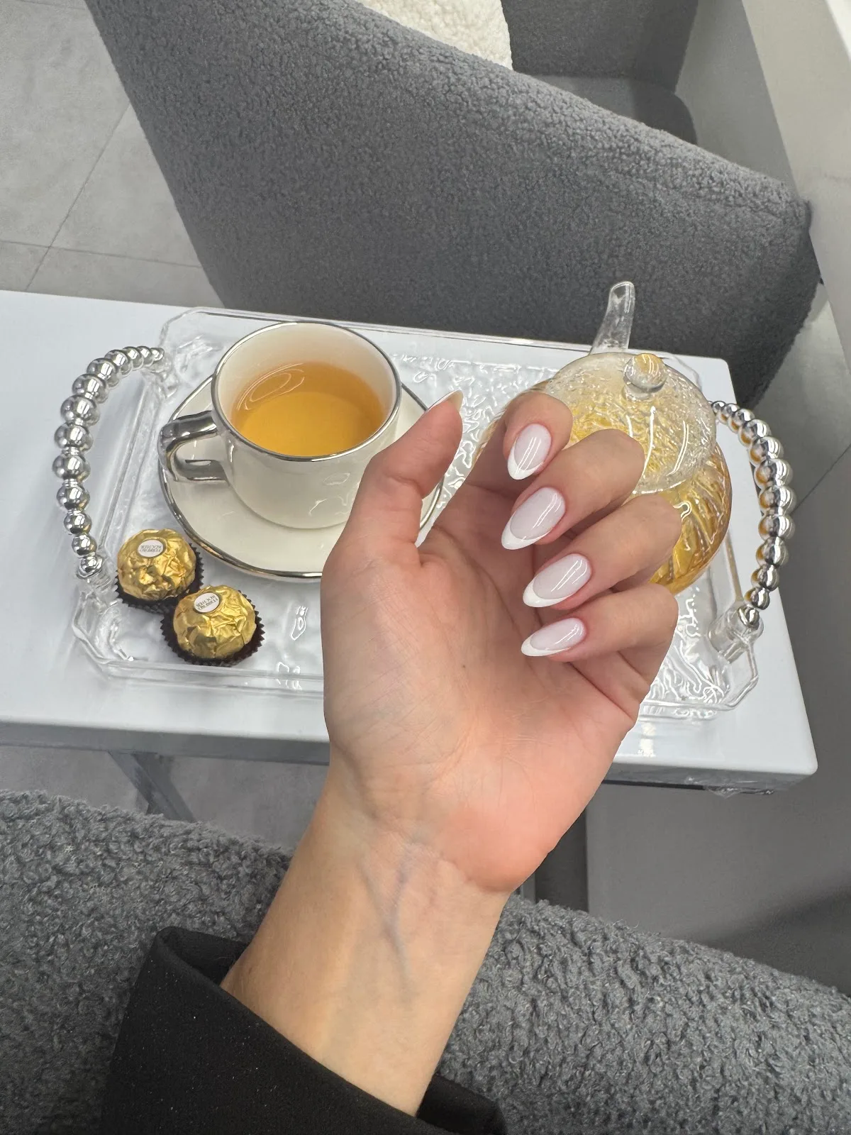 Elegant almond nails and tea service at CRUSH