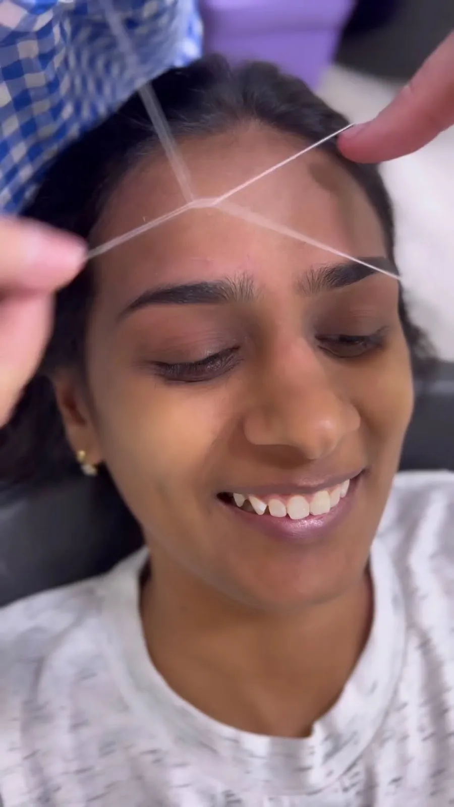 Eyebrow threading at Kim's Beauty Salon
