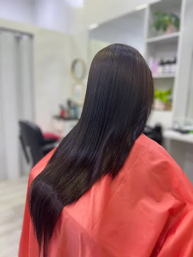 Long, sleek styled hair, back view