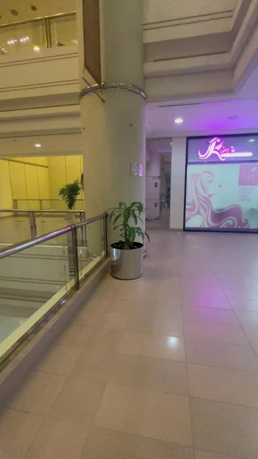 Kim's Beauty Salon storefront and pink sign in Deira Twin Towers