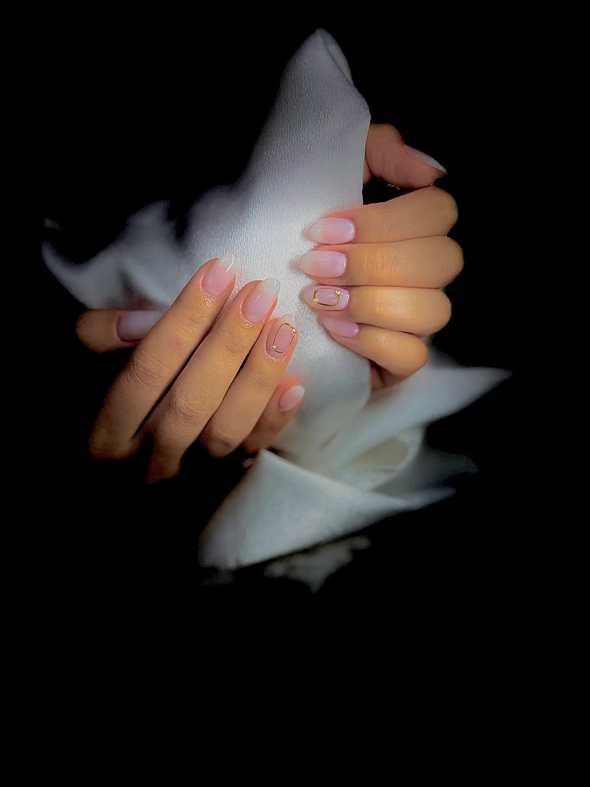 Soft French nail finish with delicate gold detail at Sibs Style Beauty Lounge