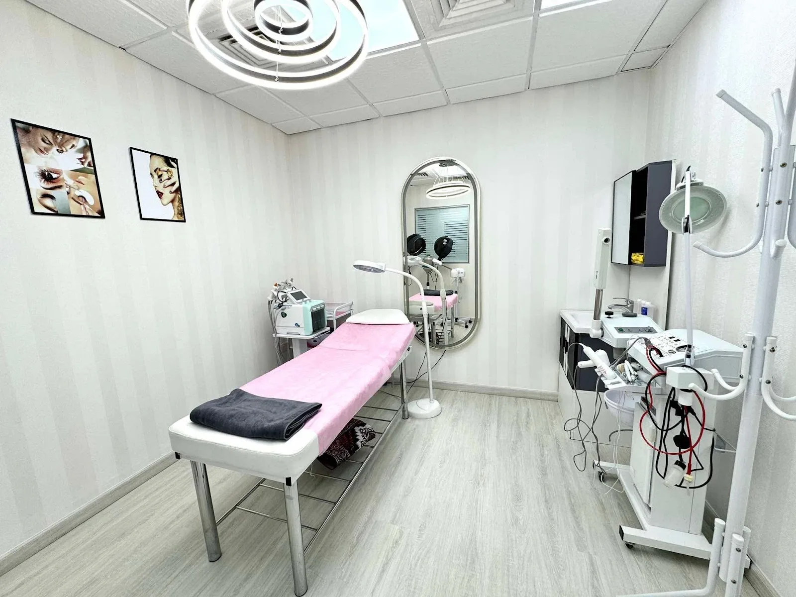 Bright, rose-toned treatment room at Sibs Style Beauty Lounge