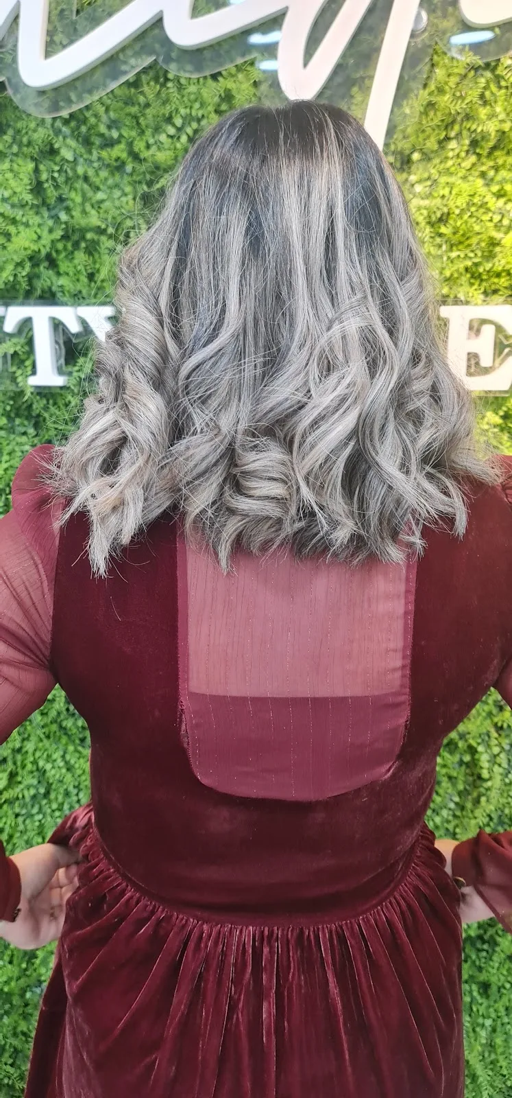 Silver balayage waves styled at the salon