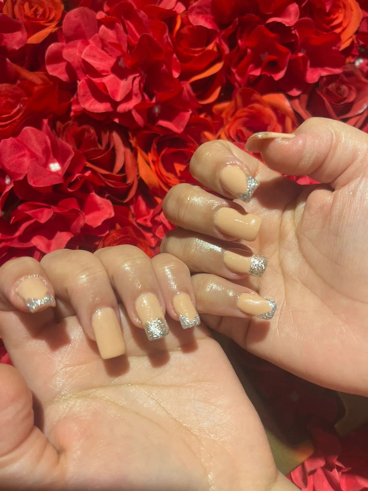 Nude nails with silver glitter tips