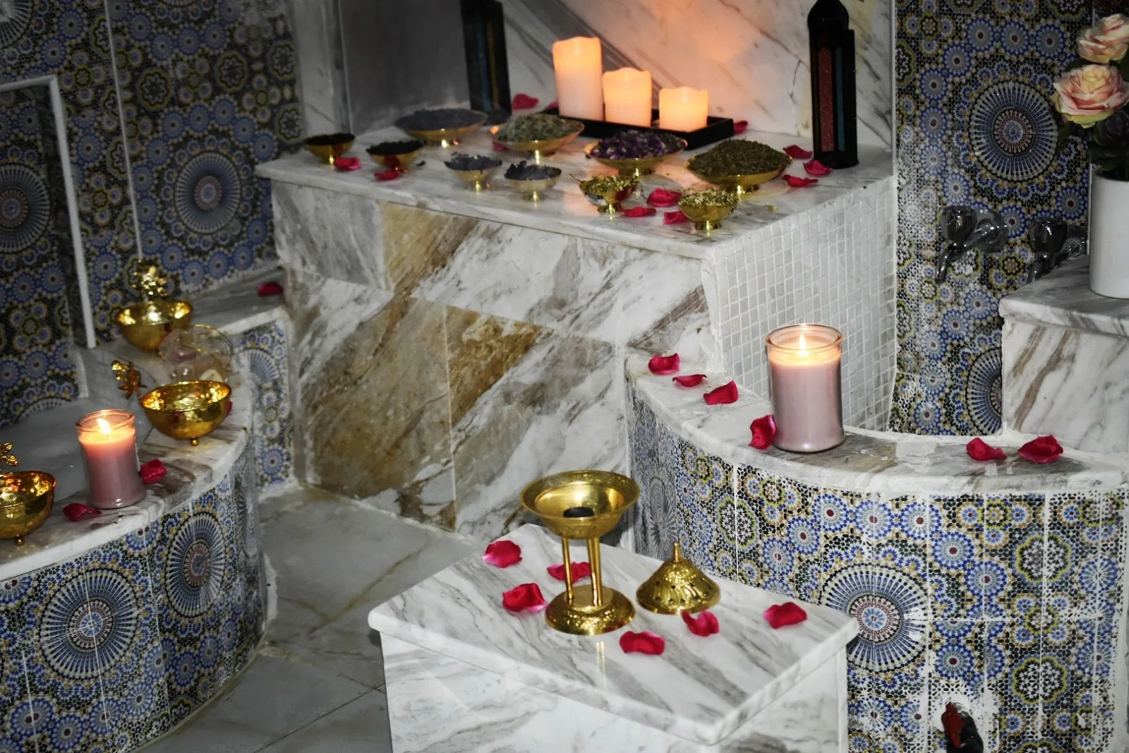 Moroccan hammam ritual setup with candles