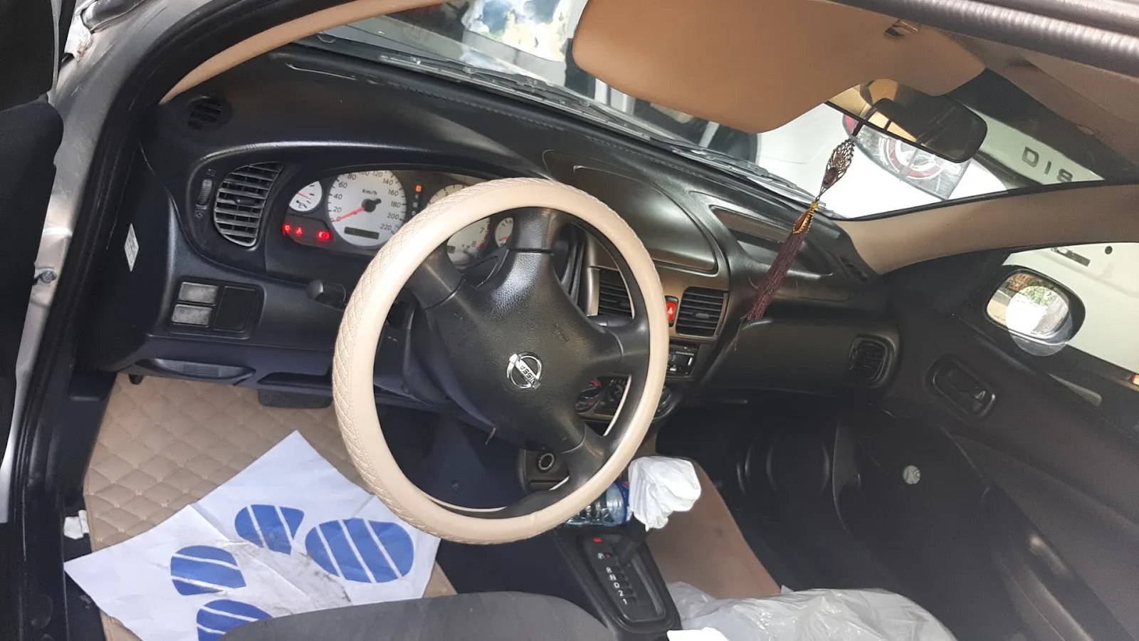 Interior and electrical detail of a vehicle being checked