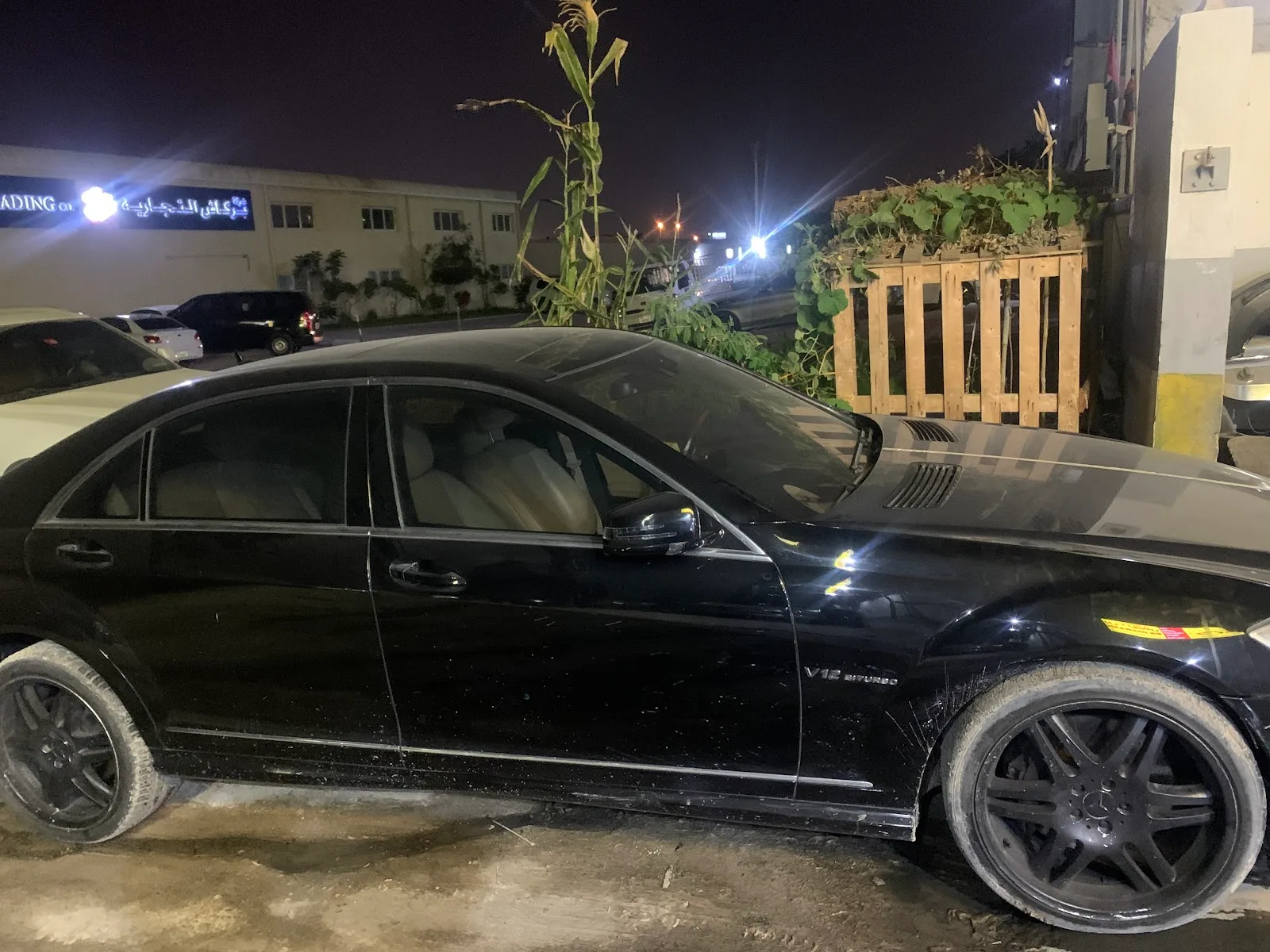 A black Mercedes-Benz S-Class performance saloon at the garage