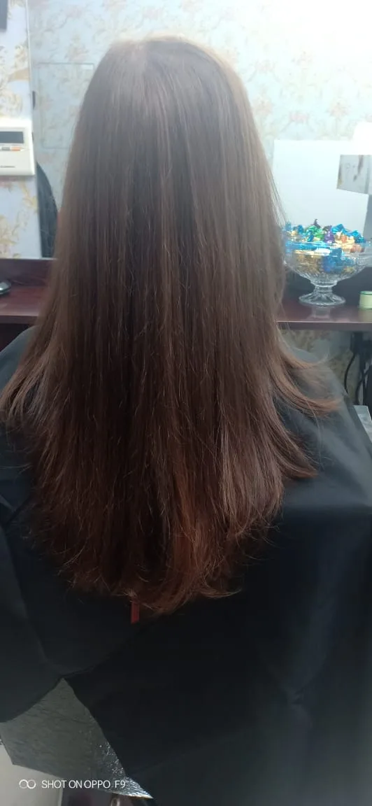 Long layered hair styled at Falak Ladies Salon